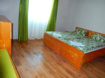 Фото номера Дом с 2 спальнями Кемпинги Turul Guesthouse and Camping г. Remetea 6